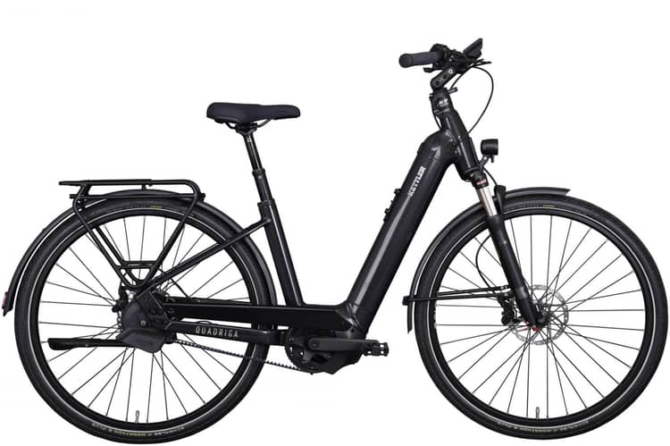 Grünes Kettler Quadriga Pro Belt Automatic D Citybike mit Riemenantrieb und Gepäckträger.