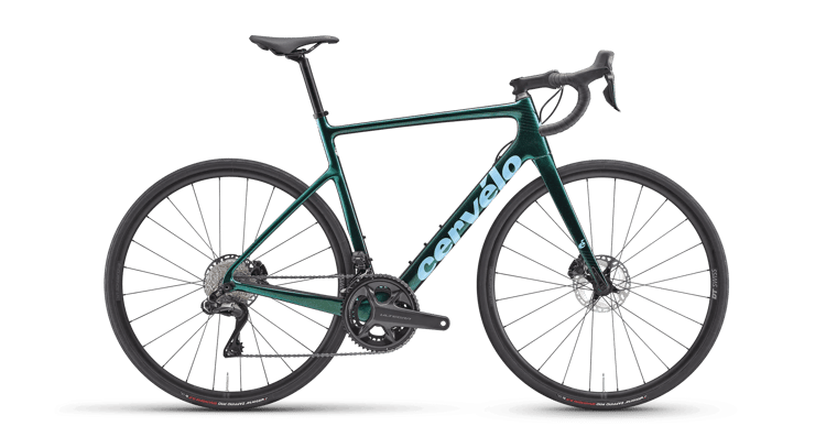 Cervelo Caledonia road bike in teal-green with disc brakes and black wheelset on a dark background.