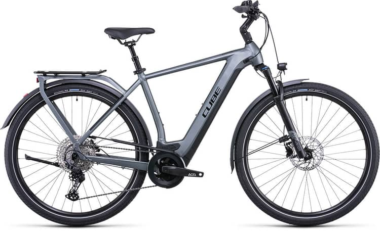 Modern beige CUBE Kathmandu Hybrid Pro electric bike with bell, lights, and rear rack.