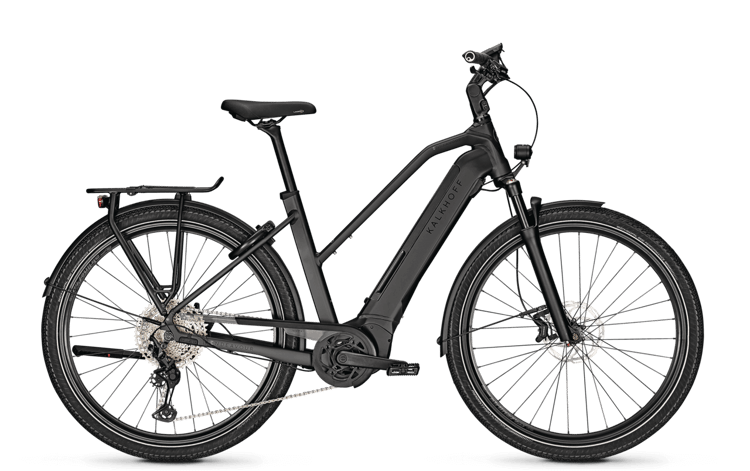 Black Kalkhoff Endeavour 5B Advance electric bicycle with rear rack, fenders, and disc brakes on a black background.