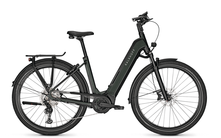 Black Kalkhoff Endeavour 5.B Advance electric bike with fenders, rear rack, and disc brakes on a black background.