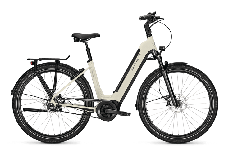 "Kalkhoff Image 5B Advance electric bike in brown with rear rack, fenders, and disc brakes on a black background."
