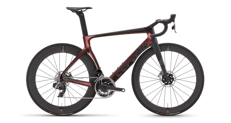 Cervelo S5 road bike in red with aerodynamic frame, integrated handlebars, and black wheelset.