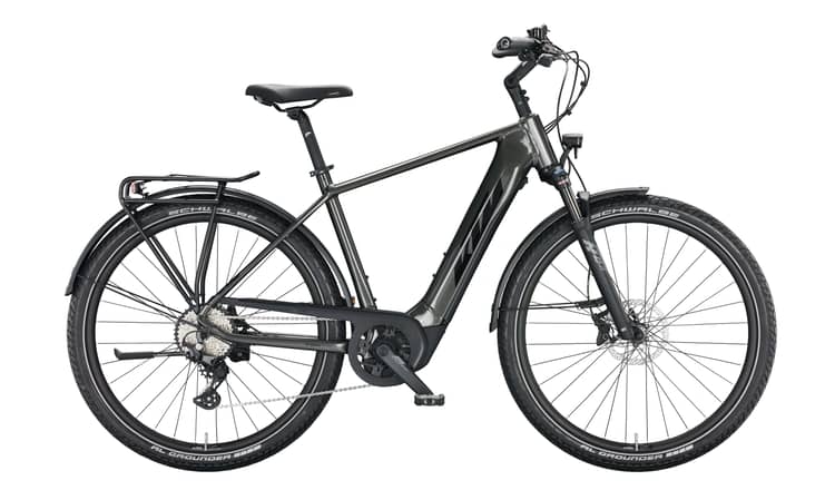 Modern grey and black electric bicycle with orange accents, fenders, and rear rack on a white background.