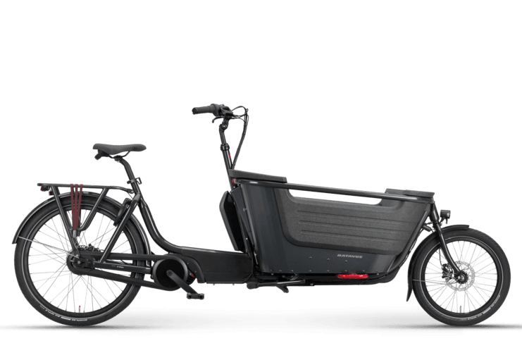 Electric cargo bike, black Batavus Fier 2 D, with a spacious front carrier, parked against a black background.