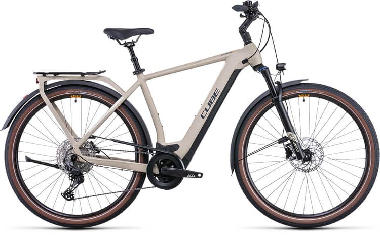 Modern beige CUBE Kathmandu Hybrid Pro electric bike with bell, lights, and rear rack.