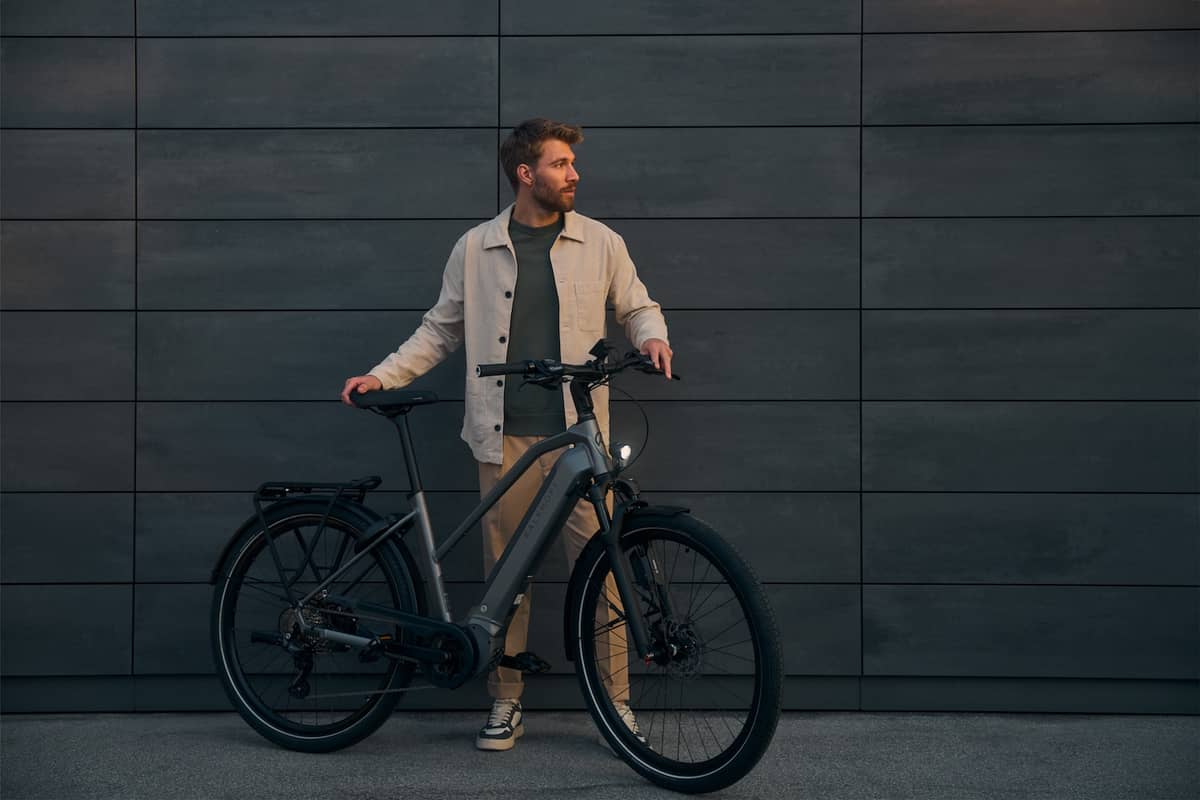 man in front of dark wall