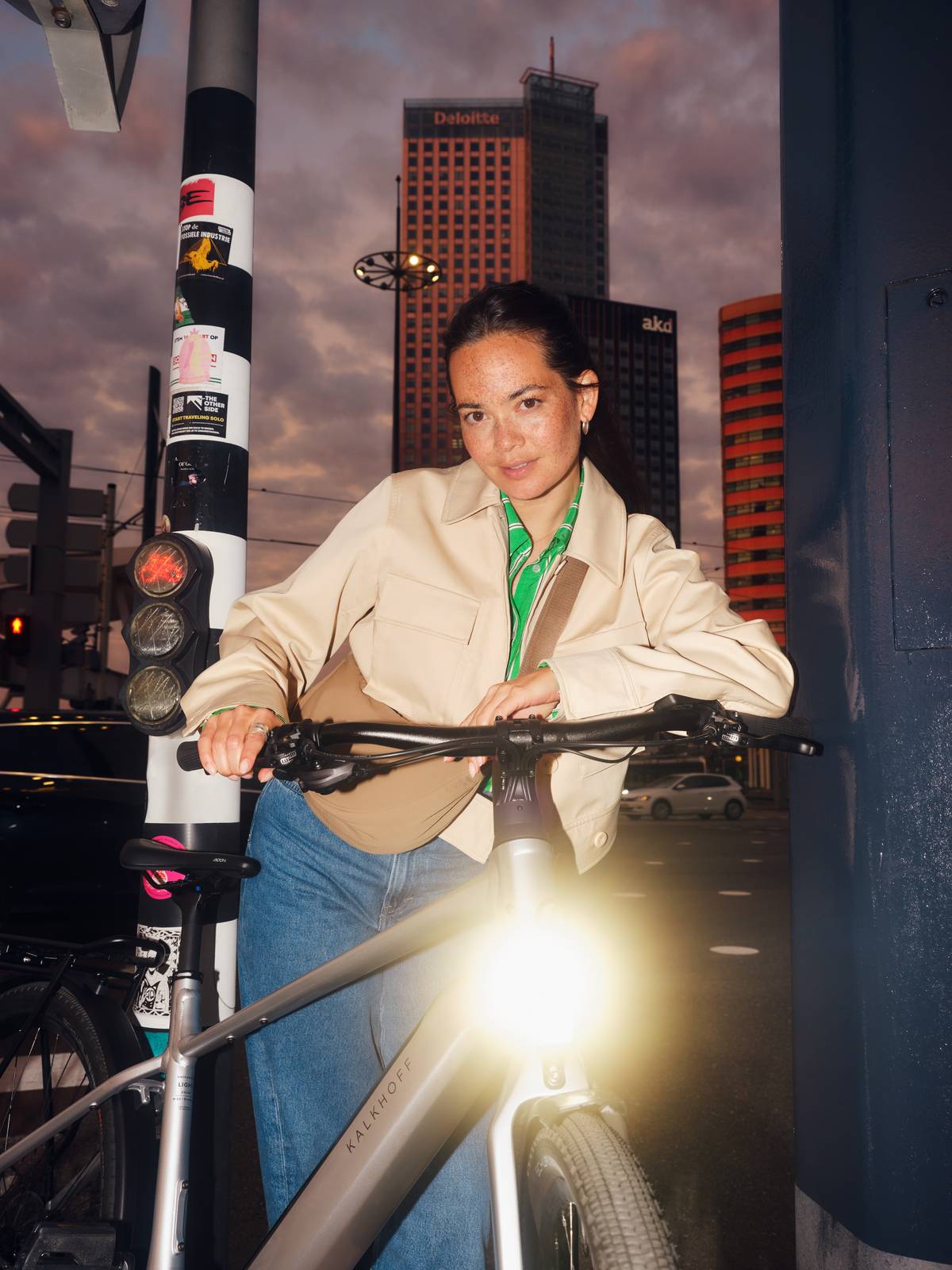 woman with bike and lights on